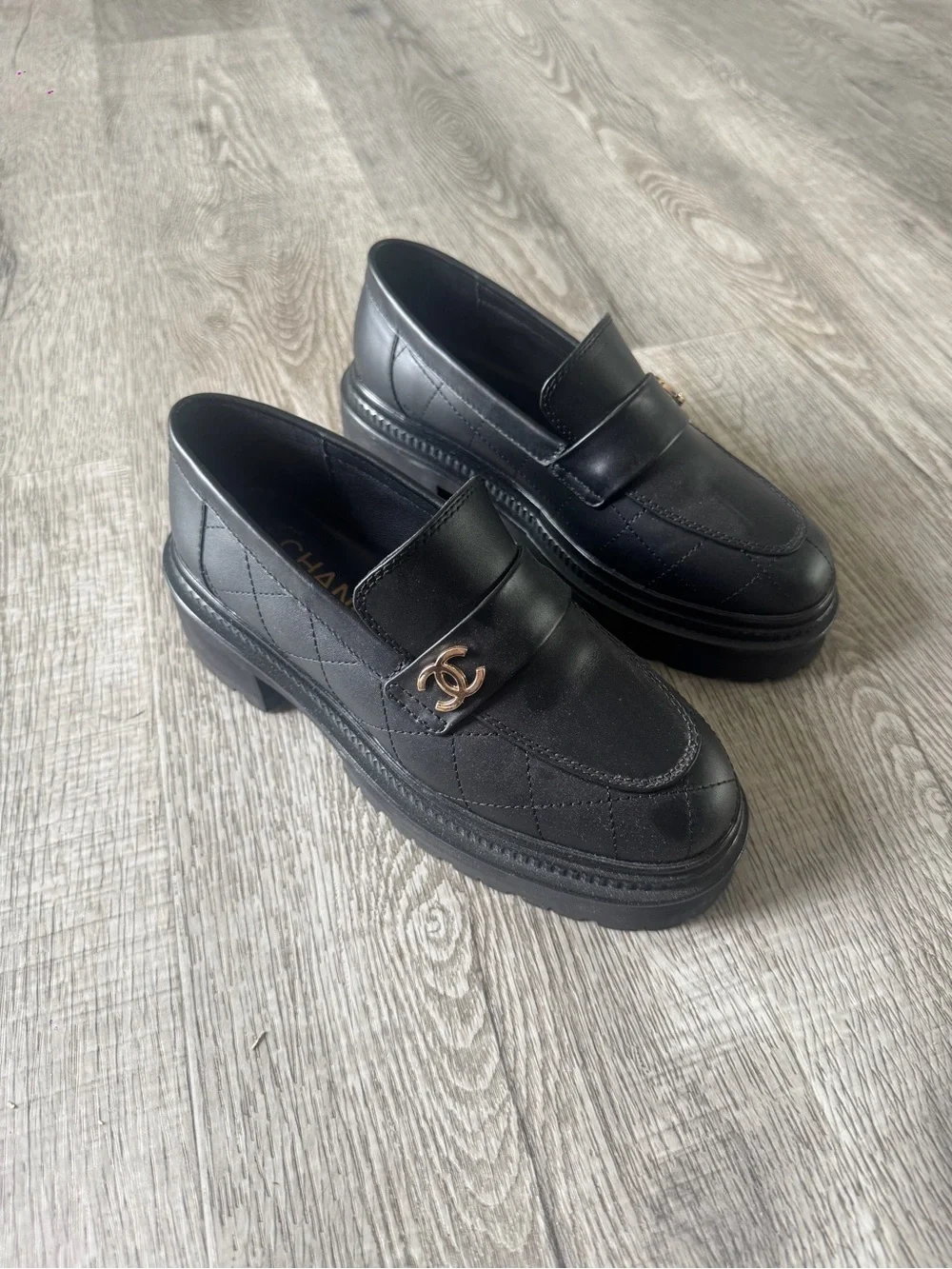 CHANEL Black Quilted Leather Loafers. Fall 2023 collection.